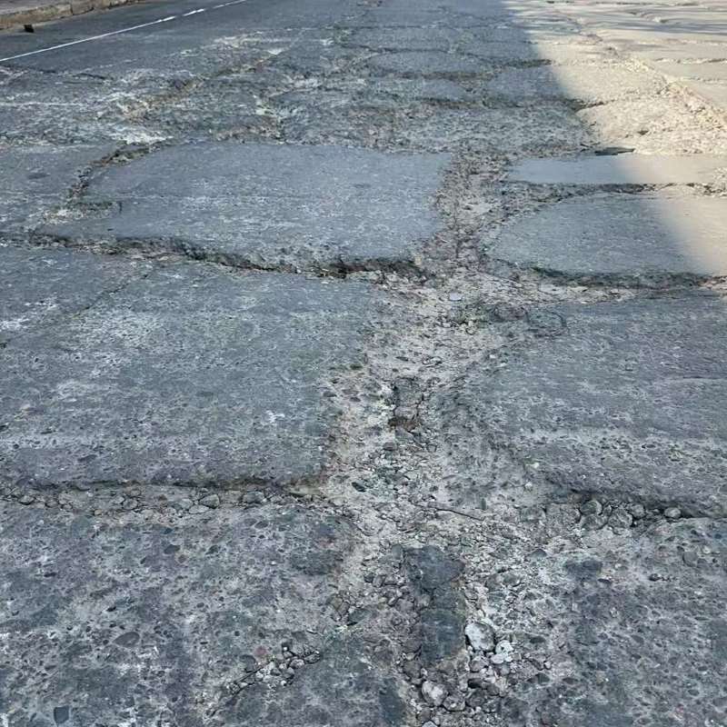 南岔路面起砂露石子修补料